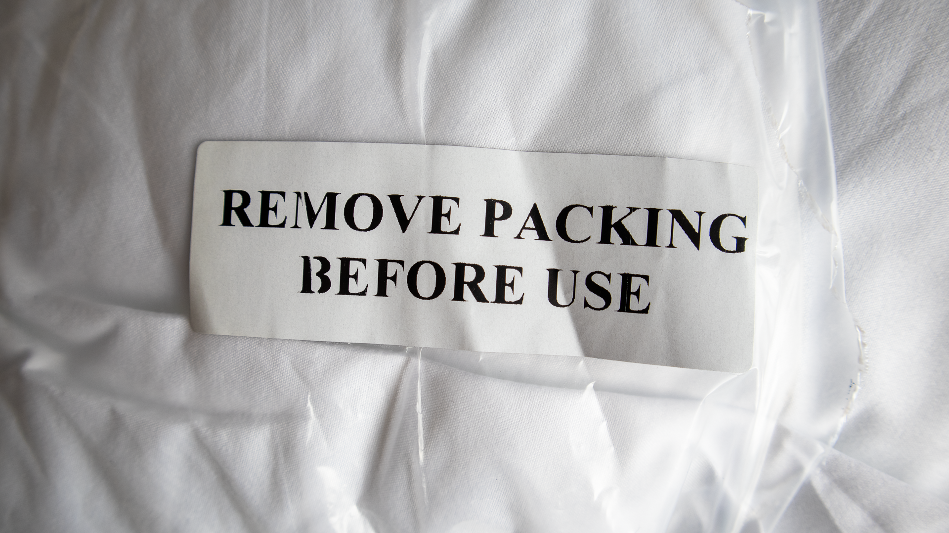 kally sleep pillow warning label